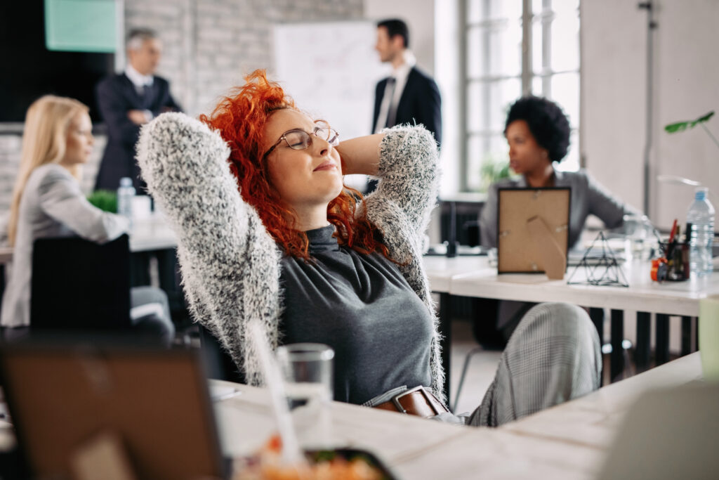 Happy businesswoman relaxing